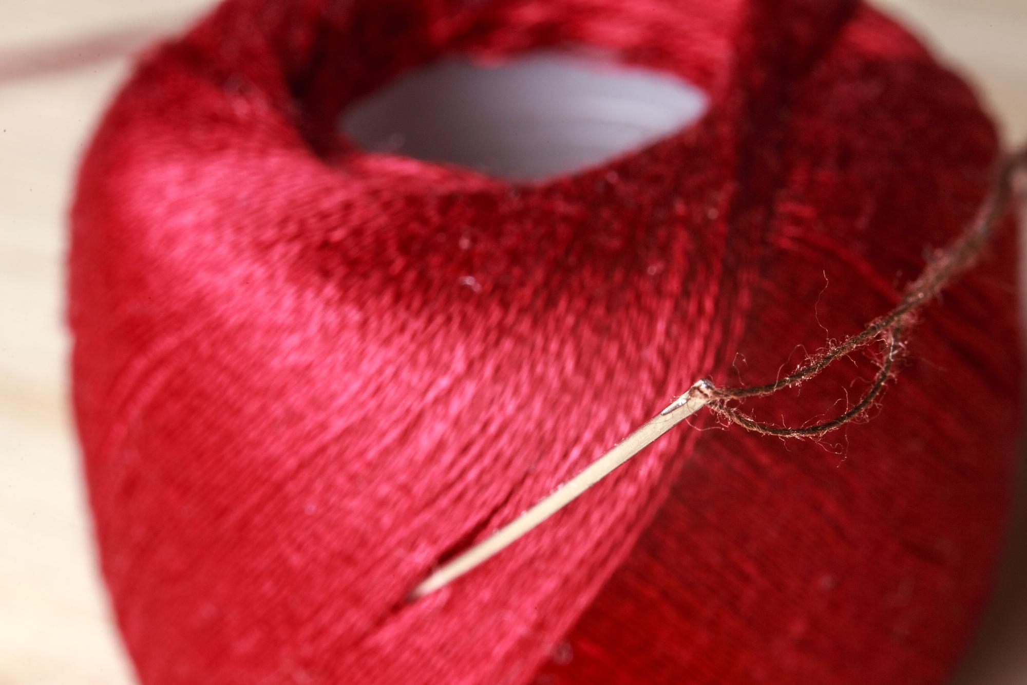 Close-up of silk thread and stitch detail